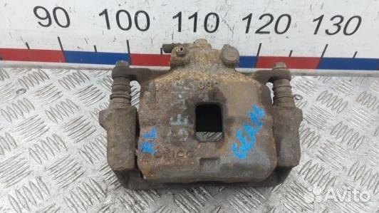 Суппорт тормозной передний левый mitsubishi L200 K