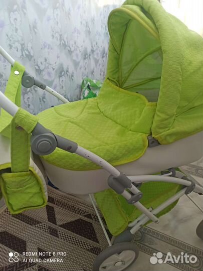 Игрушечная коляска для кукол