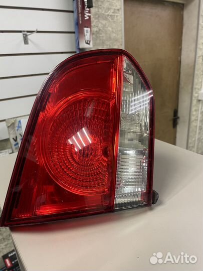 Фонарь левый в крышку Фольксваген Гольф 6