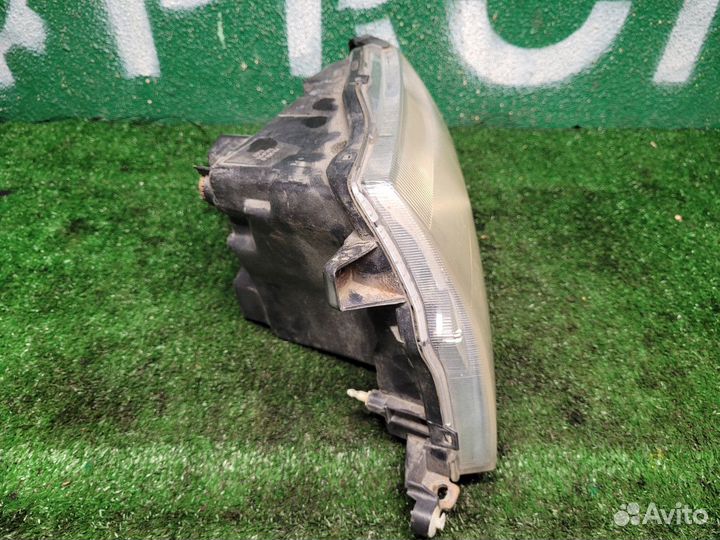 Фара левая Pajero Io