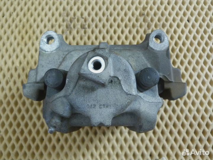 Суппорт передний правый VW Tiguan 2007-2011 (5N0615124 5N0615125)