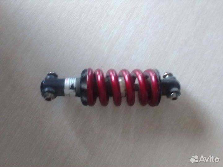 Задний амортизатор на велосипед 160