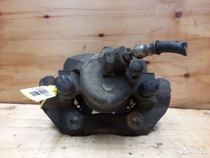 Суппорт передний правый Mazda Axela BK5P zyve 2006