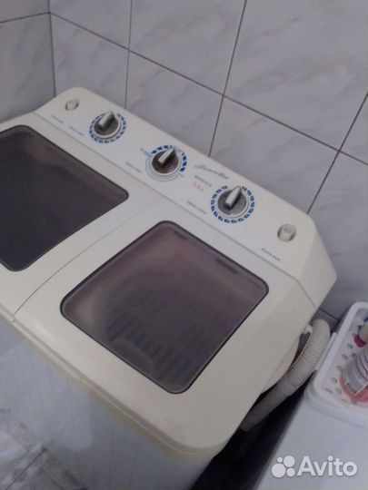 Стиральная машинка с вертикальной загрузкой