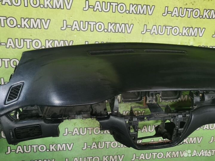 Передняя панель салона Mitsubishi Lancer