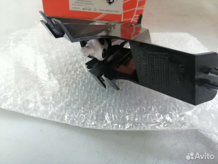 Форсунка омывателя фар левая Nissan Qashqai J10