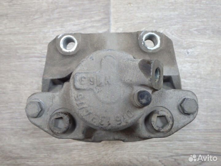 Суппорт тормозной передний левый Sandero Сандеро