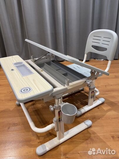 Расстущая парта