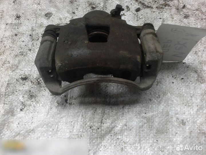 Суппорт передний левый Daewoo Nexia 2008