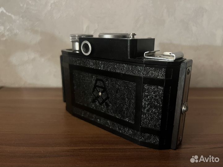 Плёночный фотоаппарат смена