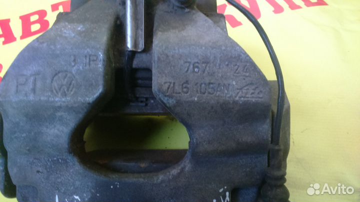 Суппорт передний левый Volkswagen Touareg