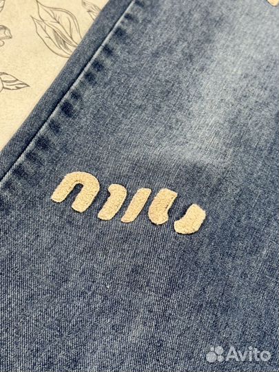 Джинсы женские широкие