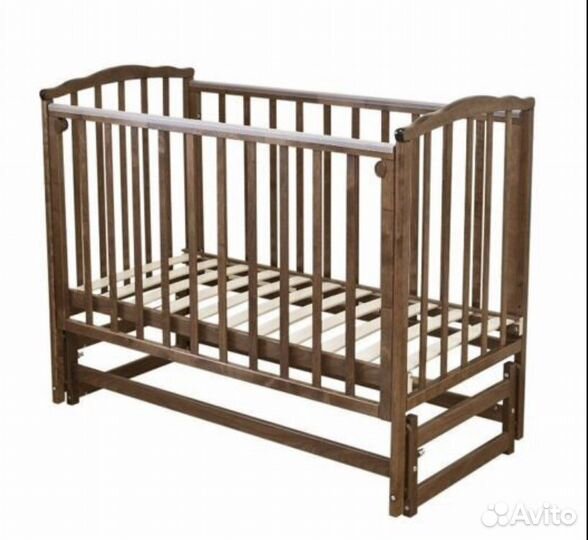 Детская кроватка с маятником