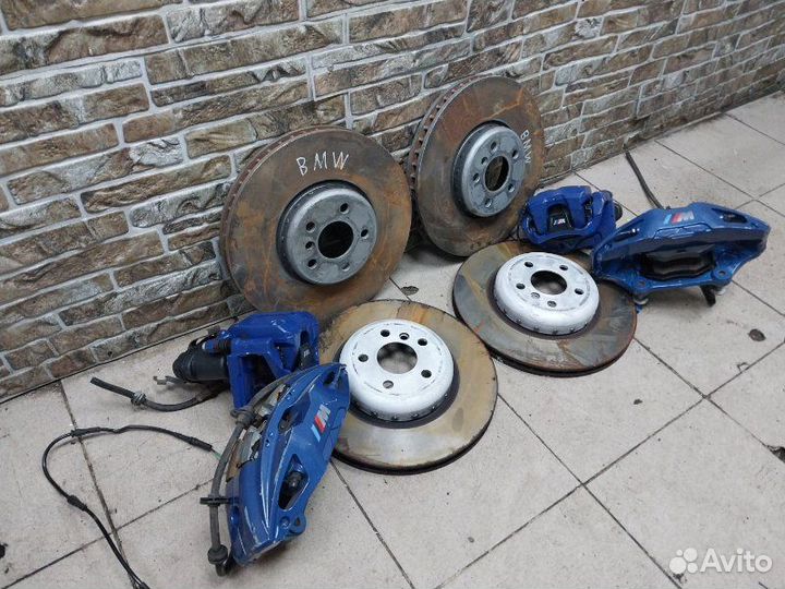 Суппорт тормозной BMW 5-Series/M5