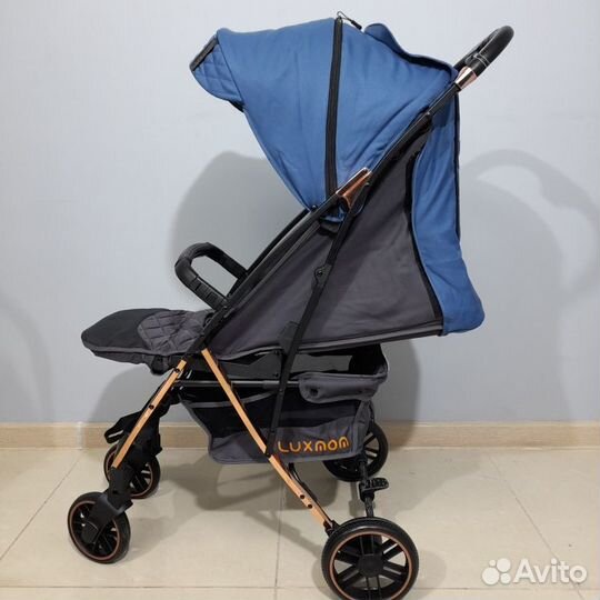 Прогулочная коляска цвет синий