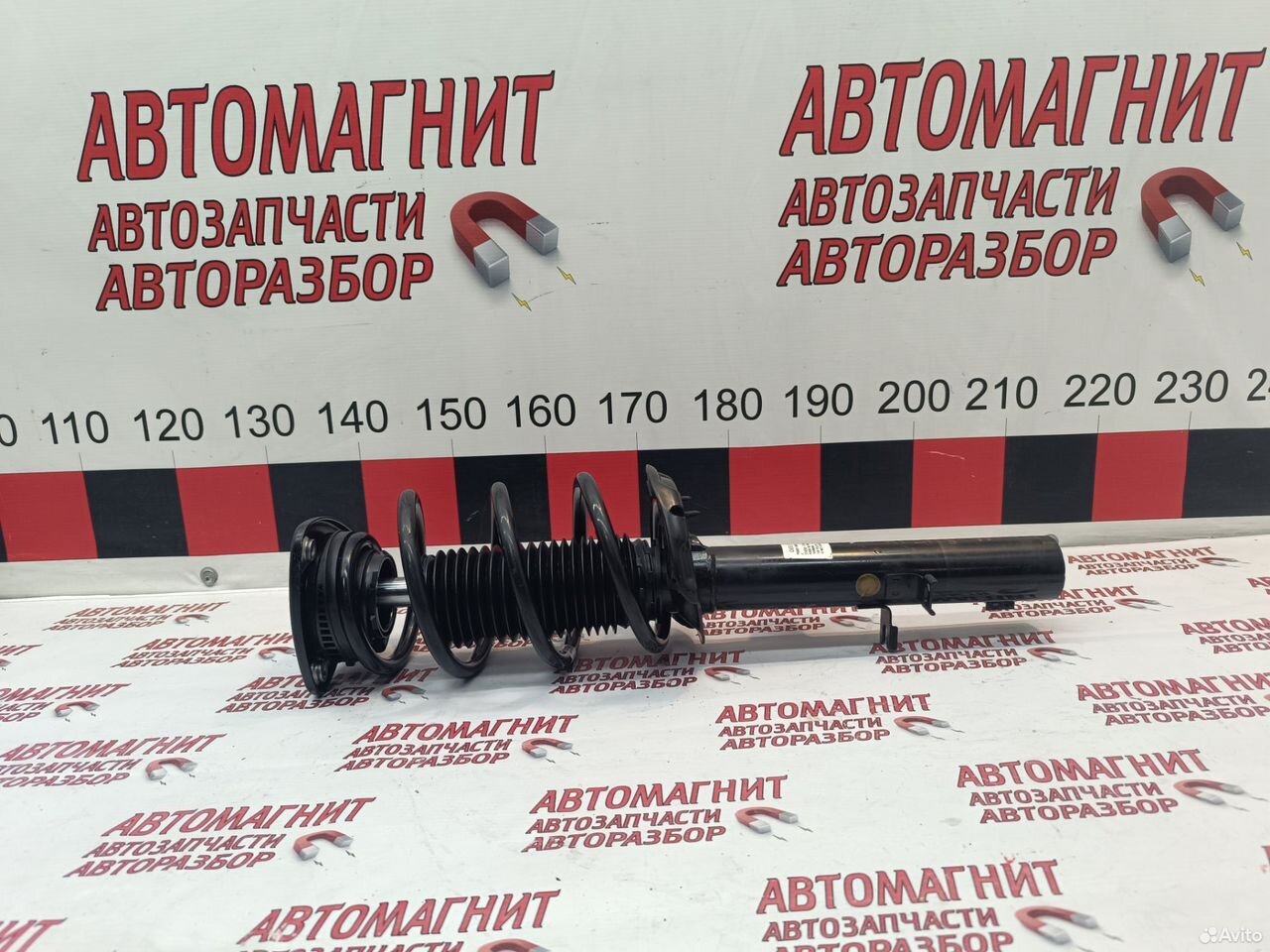 Стойка передняя левая амортизатор Geely Atlas 2