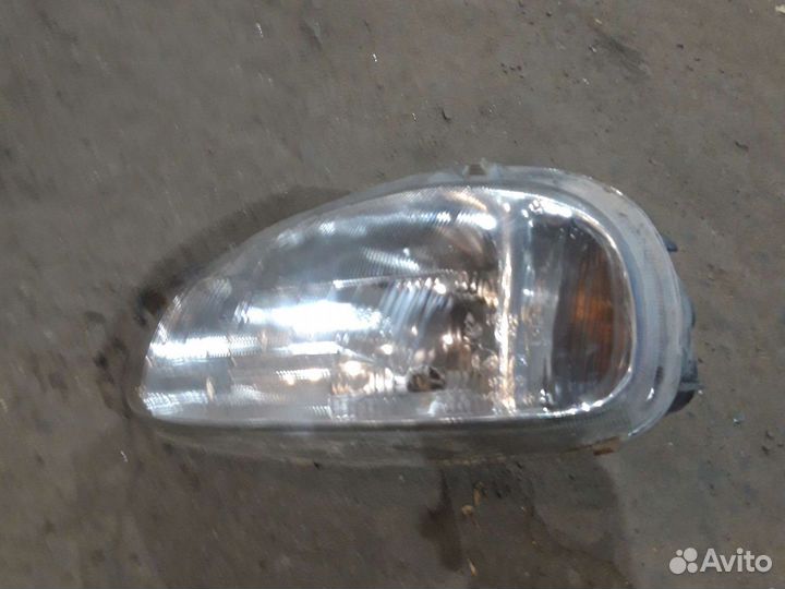 Фара левая Опель Корса В 94-00