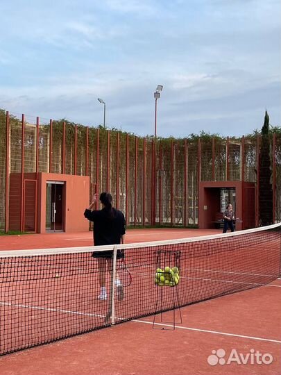 Тренер по большому теннису