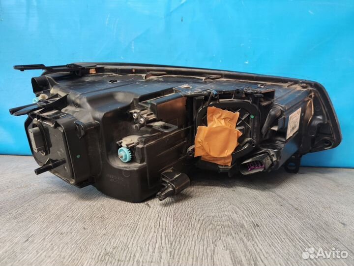 Фара левая Volkswagen Touareg 2 2010-2018