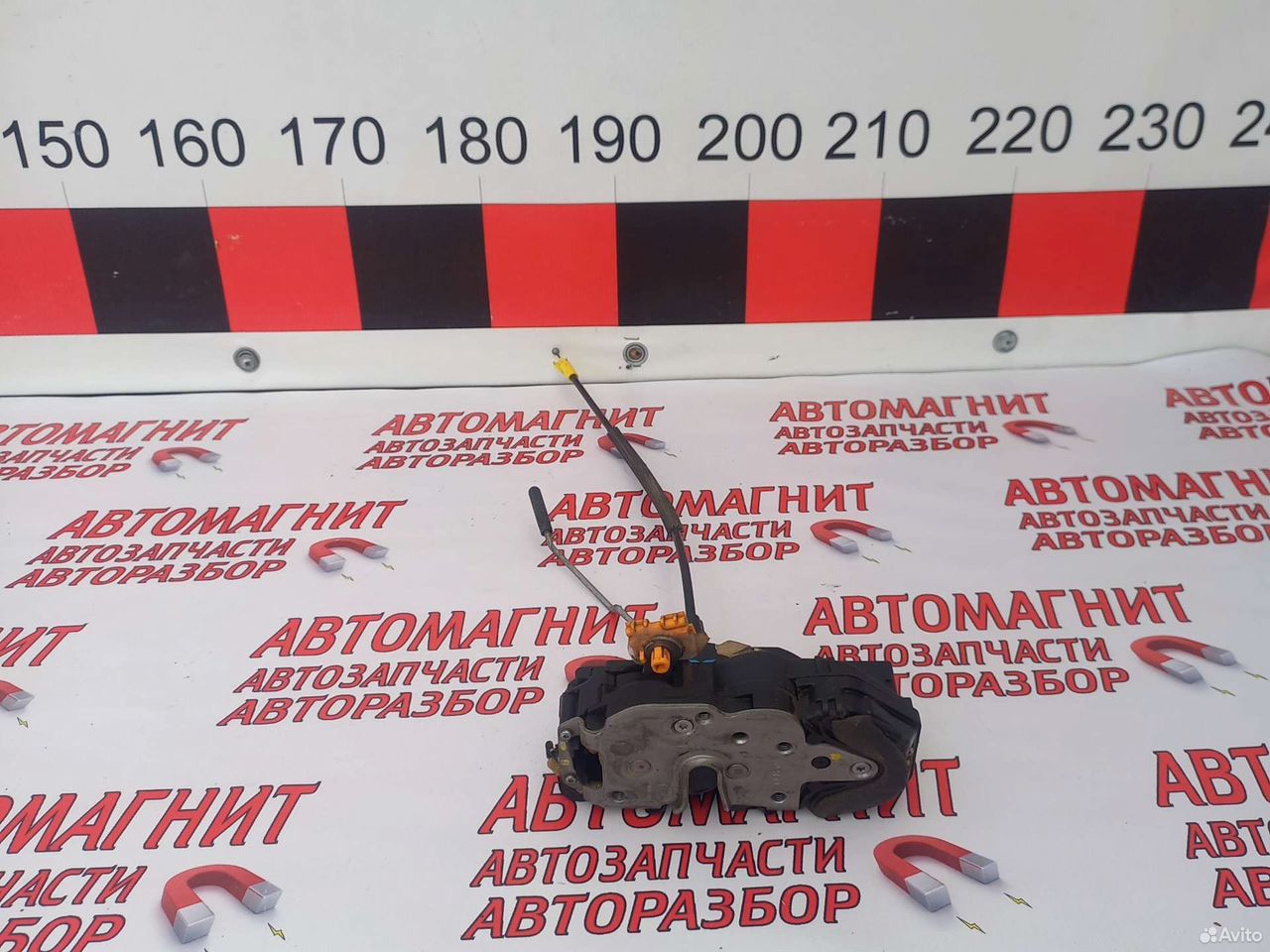 Замок задний левый Опель Астра Джей J