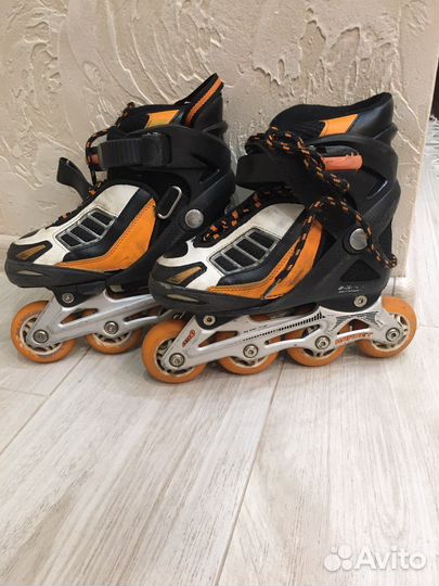 Роликовые коньки