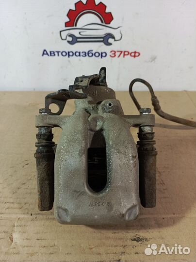 Суппорт тормозной задний Peugeot 308