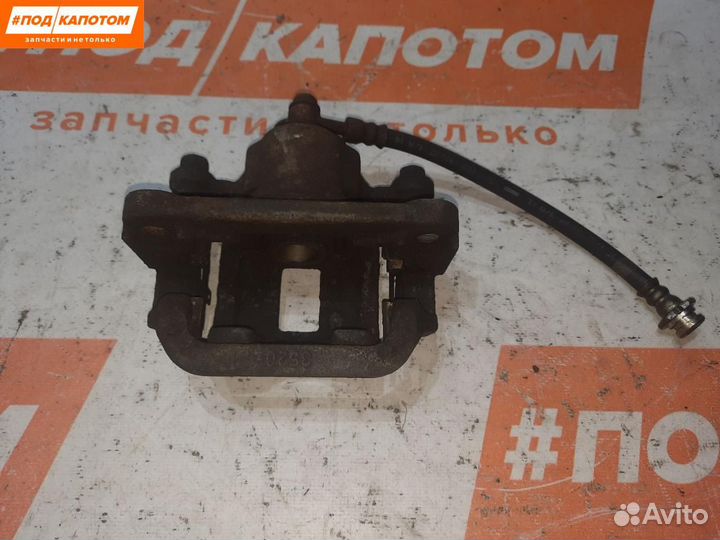 Суппорт тормозной задний левый Nissan X-Trail T31