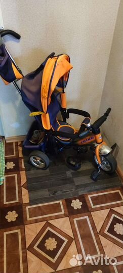 Трехколесный велосипед с родительской ручкой