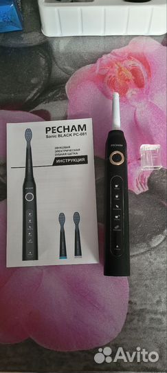 Электронная зубная щетка