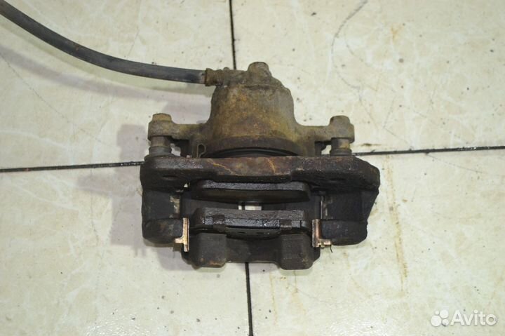 Тормозной суппорт перед лев Toyota Yaris