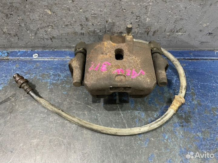 Суппорт задний правый Mitsubishi Pajero 3 V70