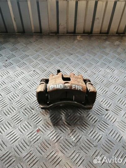 Суппорт тормозной передний правый Kia Rio 3 QB