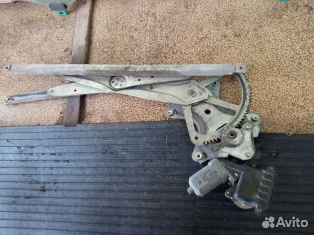 Стеклоподъемник левый передний toyota Camry