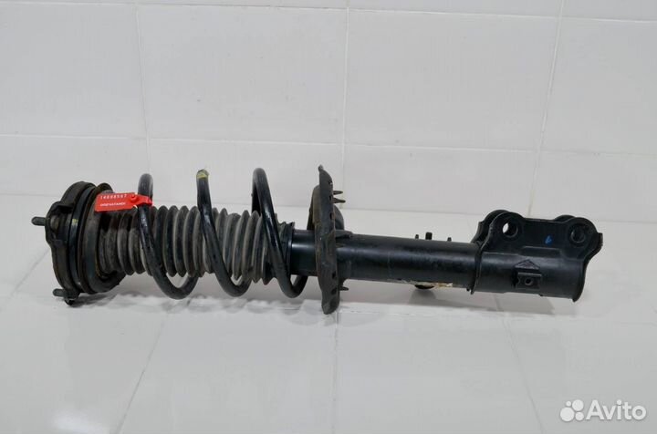 Стойка амортизатора передняя правая Kia Sportage 4