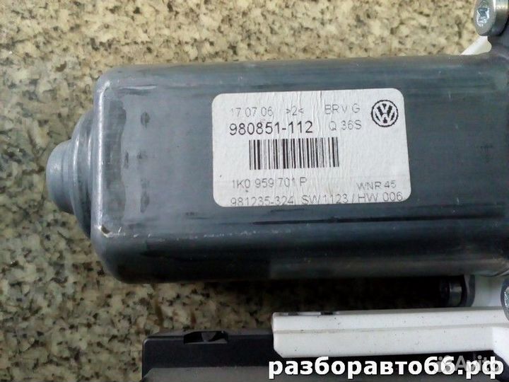 Моторчик стеклоподъемника передний левый