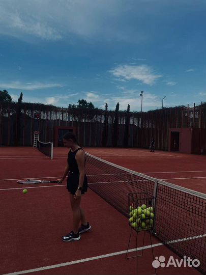 Тренер по большому теннису