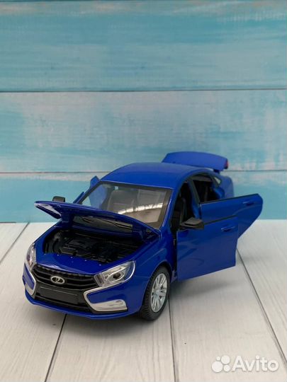 Модель автомобиля LADA Vesta металл 1:24