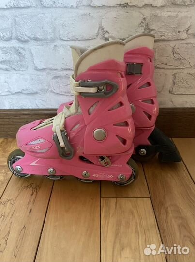 Роликовые коньки roces
