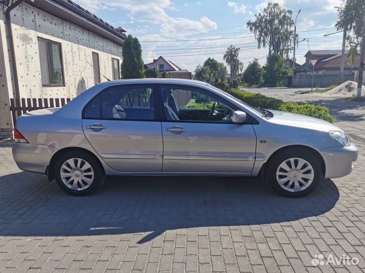 Mitsubishi Lancer 1.3 МТ, 2006, 135 000 км