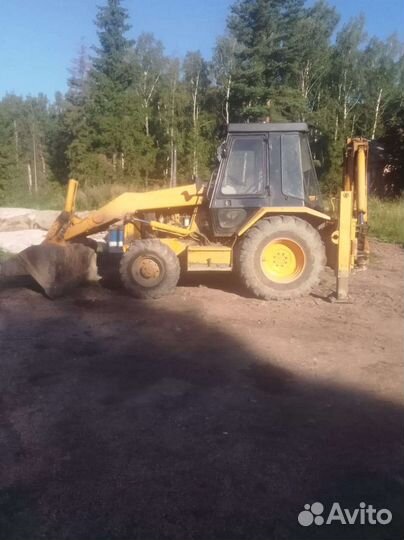 Экскаватор-погрузчик CAT 428B, 1995