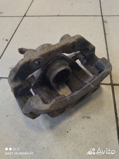 Суппорт тормозной передний левый Daewoo Nexia