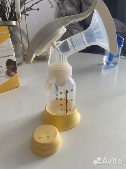 Молокоотсос medela ручной + пакеты