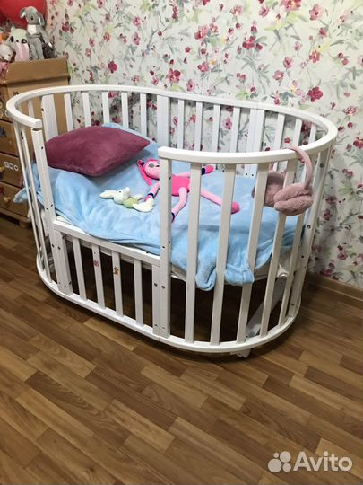 Детская кроватка с маятником круглая