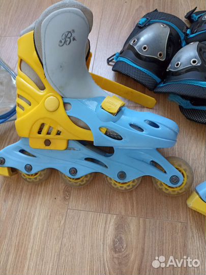 Роликовые коньки