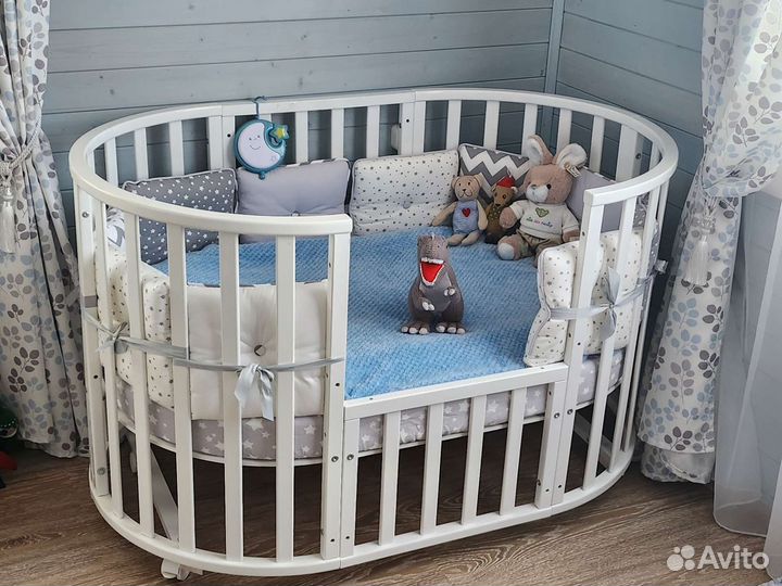 Детская кроватка-трансформер с маятником