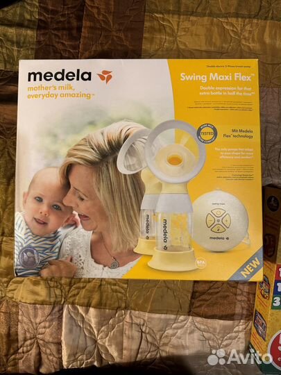 Молокоотсос электрический двойной medela