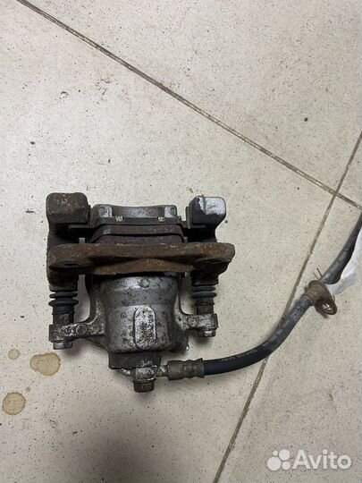 Суппорт задний правый Camry ACV40