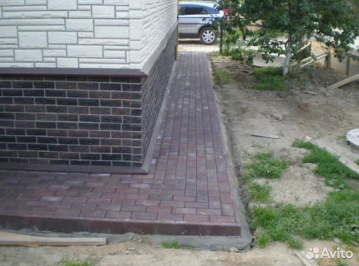 Кладка тротуарной плитки брусчатки бордюров