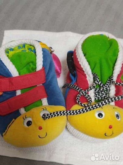 Развивающие башмачки, пазлы, руль, резиночки