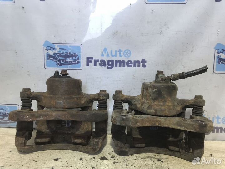 Суппорт тормозной передний Hyundai Elantra (J2)